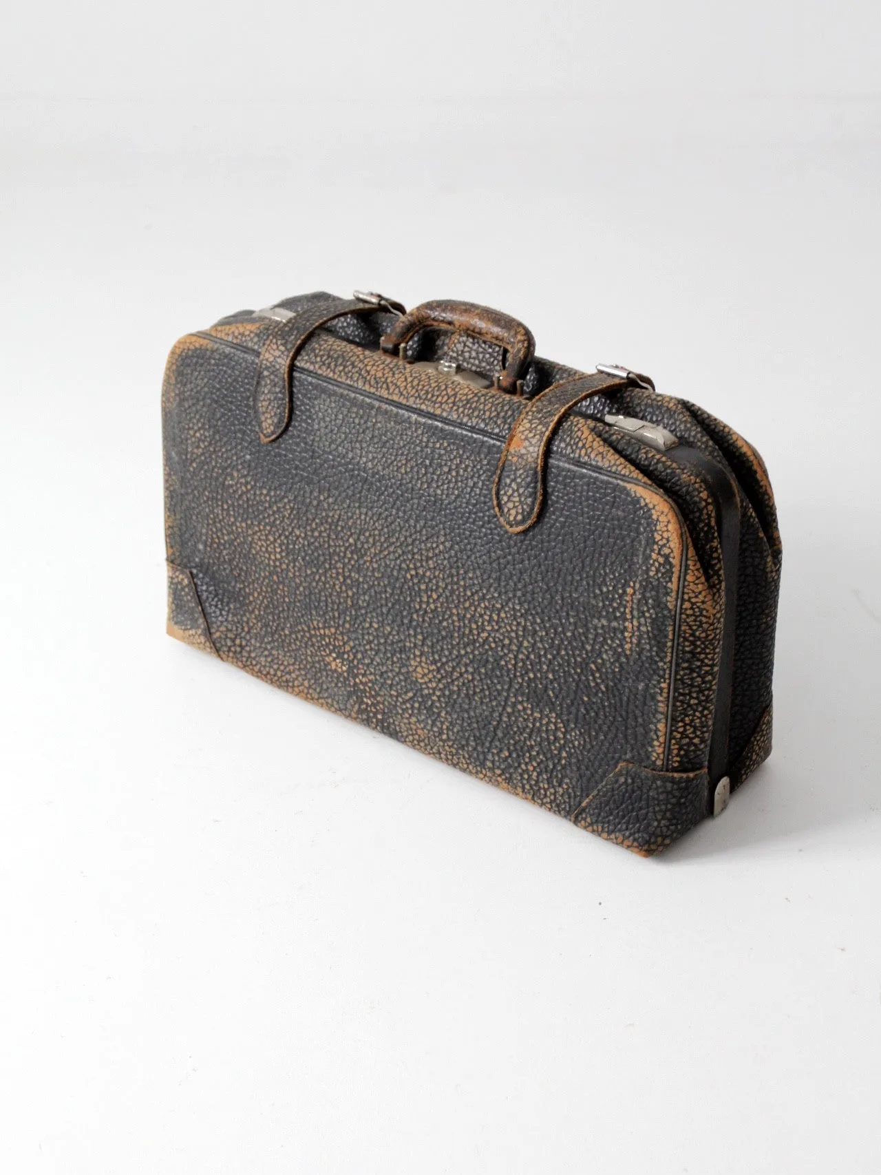 black leather suitcase circa 1930