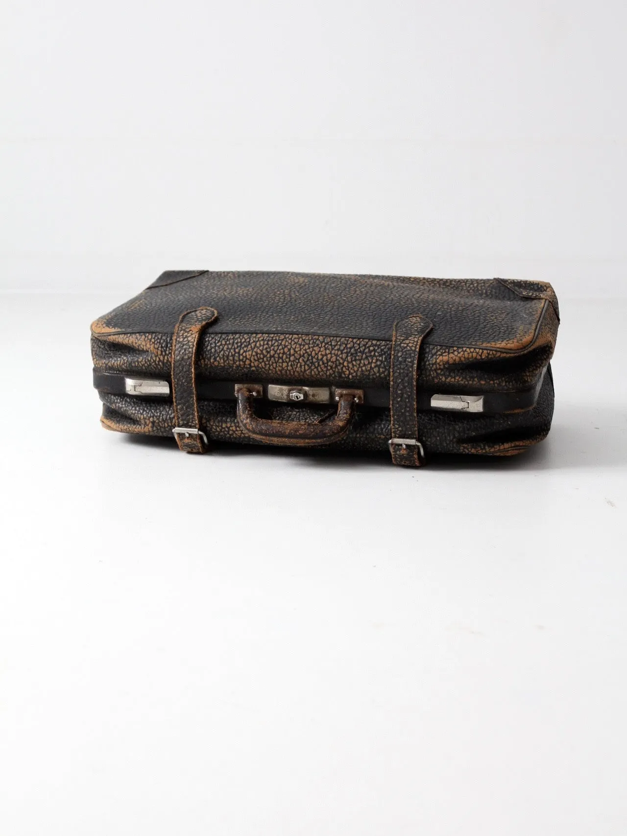 black leather suitcase circa 1930